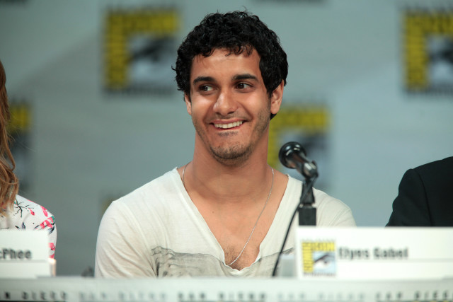 Man smiling table microphone woman free wallpaper - medium preview image