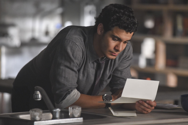Man looking paper table pen free wallpaper - medium preview image