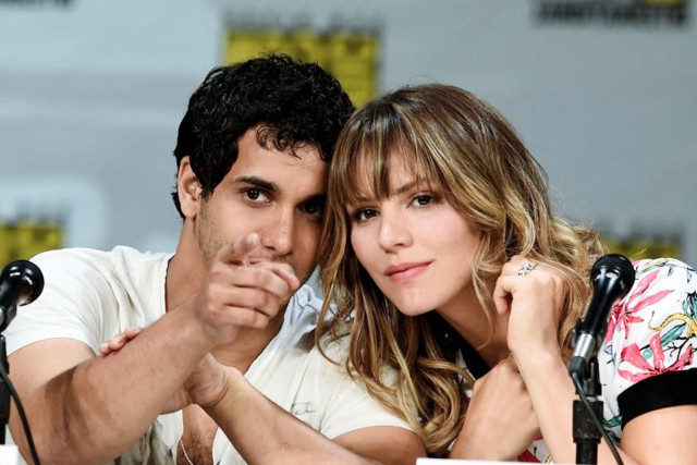 Man woman sitting table microphones free wallpaper - medium preview image
