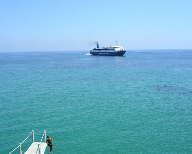 Man dock large boat ocean #2 free wallpaper - medium preview image