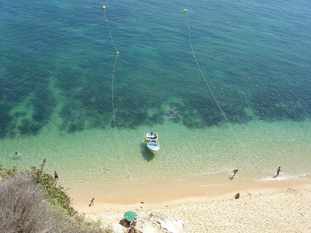 Boat tied rope beach people #2 free wallpaper - medium preview image
