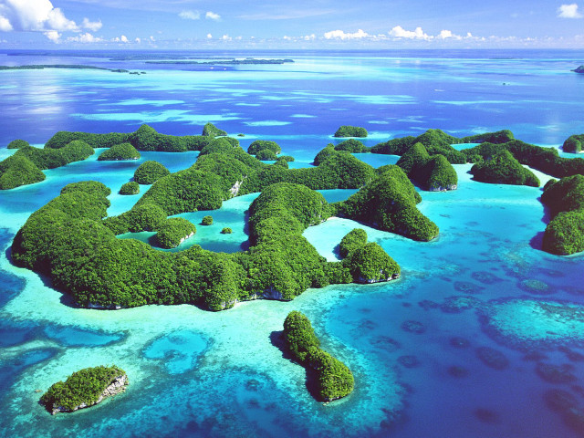 Small islands ocean boat distance #3 free wallpaper - medium preview image