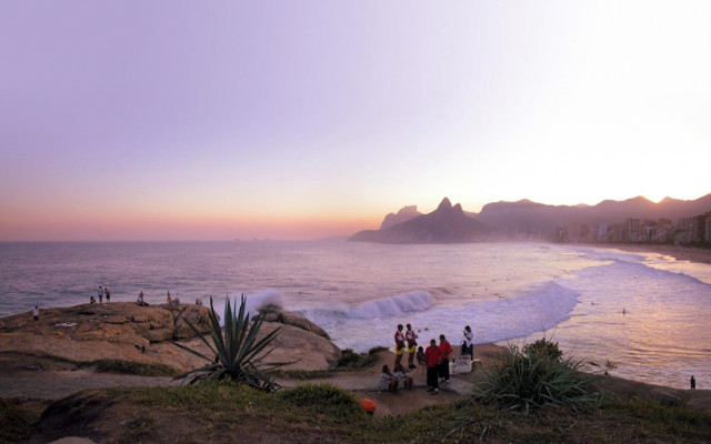 Beach sunset ocean mountains group free wallpaper - medium preview image