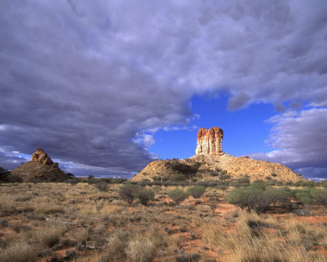 Large rock formation desert cloudy free wallpaper - medium preview image