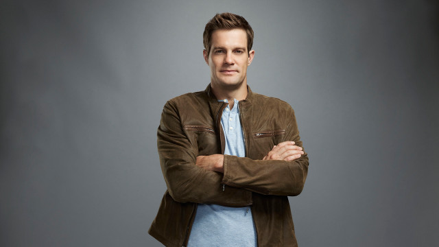 Man arms crossed brown jacket free wallpaper - medium preview image