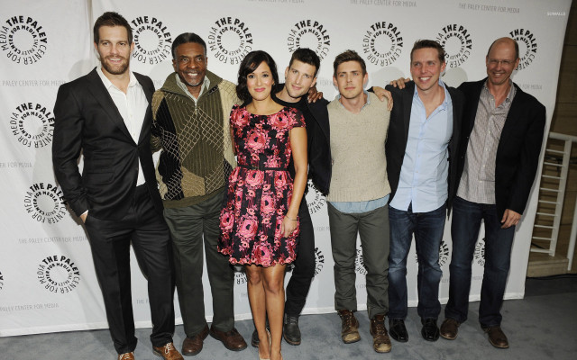 Group people carpet white wall free wallpaper - medium preview image