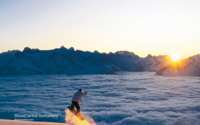 Skiing sunset mountain clouds distance free wallpaper - medium preview image