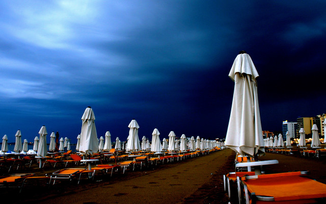 Beach chairs umbrellas night dark free wallpaper - medium preview image