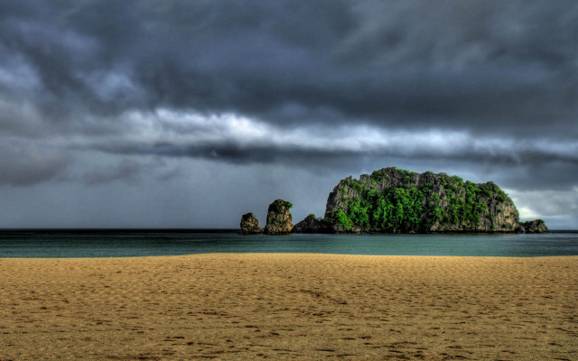 Beach rock formation cloudy sky free wallpaper - medium preview image