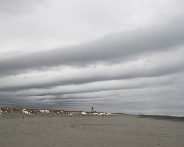 Kite beach cloudy lighthouse person free wallpaper - medium preview image