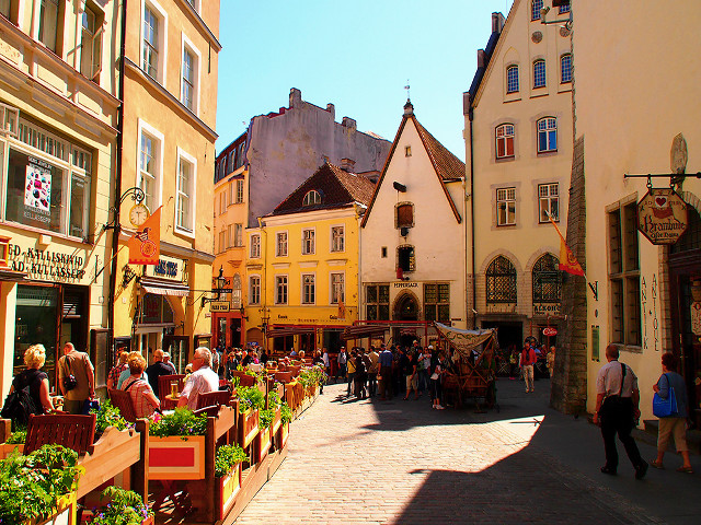 Street people walking buildings eating free wallpaper - medium preview image