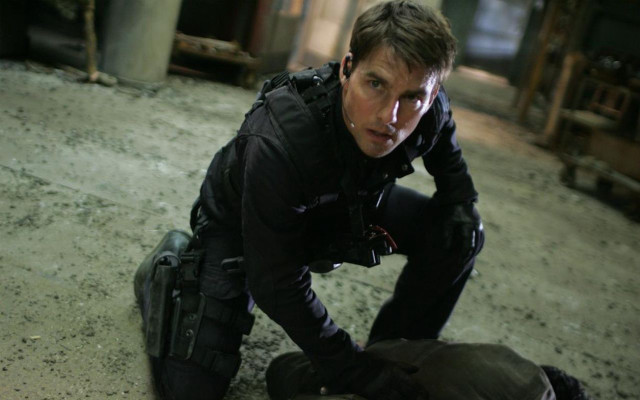 Man kneeling dead animal warehouse free wallpaper - medium preview image