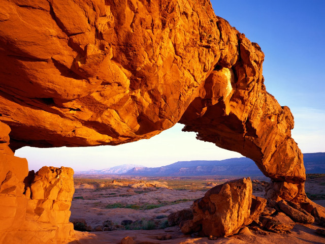 Large rock formation small hole free wallpaper - medium preview image