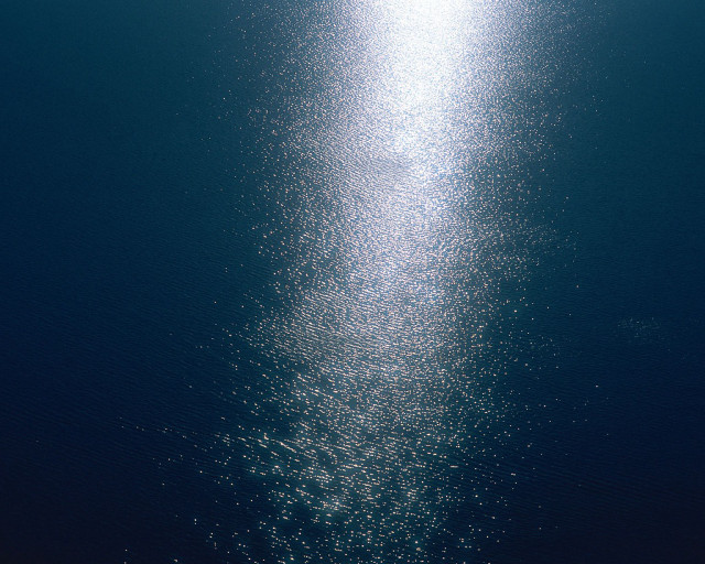 Boat floating water beach sunshine free wallpaper - medium preview image