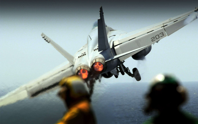 Fighter jet ocean man looking #2 free wallpaper - medium preview image