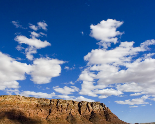 Mountain cliff blue sky clouds free wallpaper - medium preview image