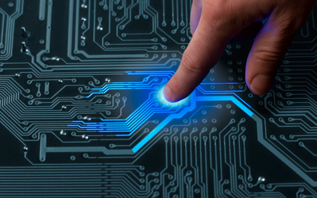 Finger touching circuit board blue free wallpaper - medium preview image