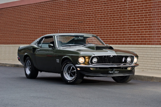 Green muscle car brick wall free wallpaper - medium preview image
