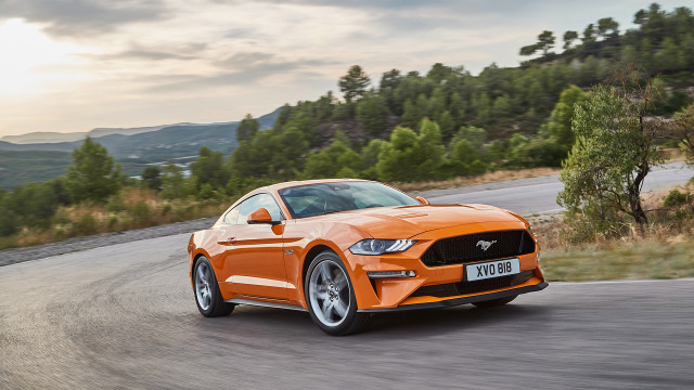 Orange mustang driving mountains trees free wallpaper - medium preview image