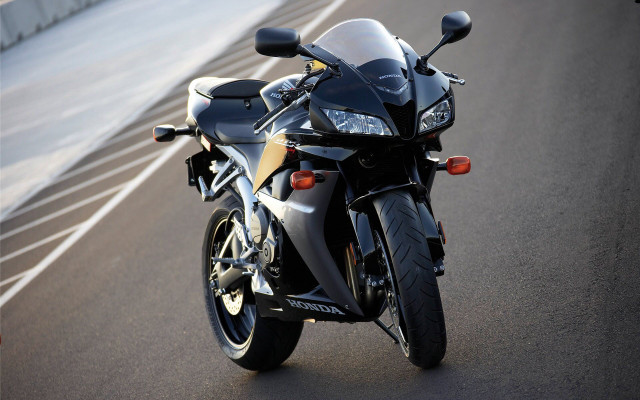 Motorcycle parked road bridge fenced free wallpaper - medium preview image
