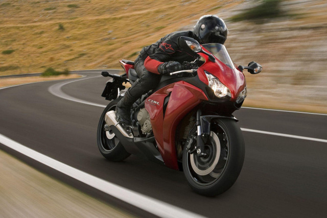 Man riding red motorcycle curvy free wallpaper - medium preview image