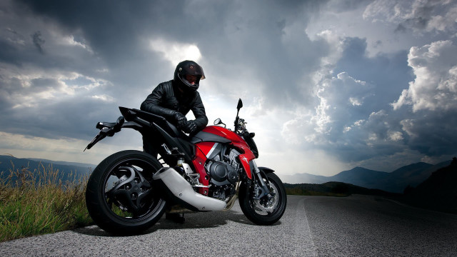 Man helmet motorcycle road stormy free wallpaper - medium preview image