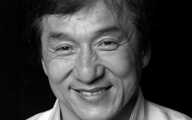 Man smiling white shirt black free wallpaper - medium preview image