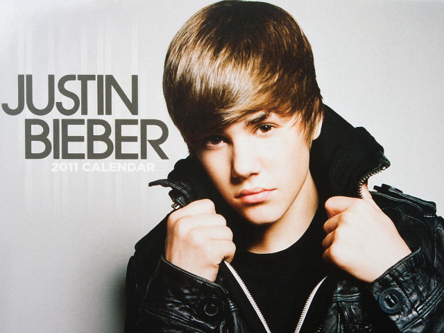 Young man black jacket posing free wallpaper - medium preview image