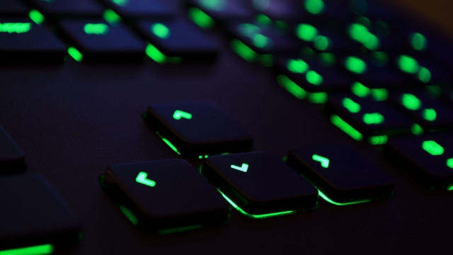 Keyboard glowing keys closeup green free wallpaper - medium preview image