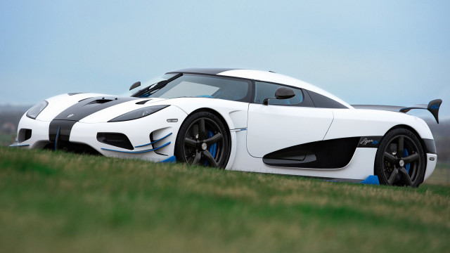 White black sports car parked free wallpaper - medium preview image