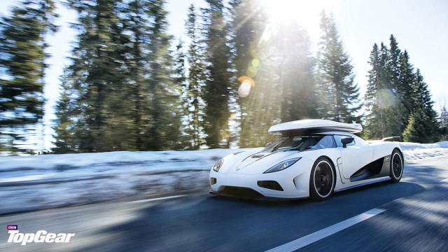 White sports car driving road #9 free wallpaper - medium preview image