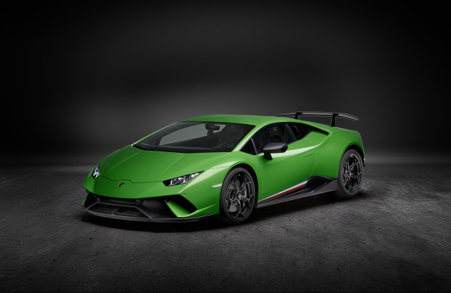 Green sports car dark room #2 free wallpaper - medium preview image