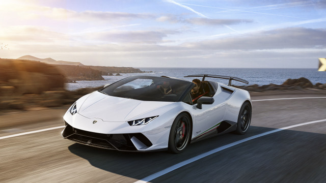 White sports car ocean cliff free wallpaper - medium preview image