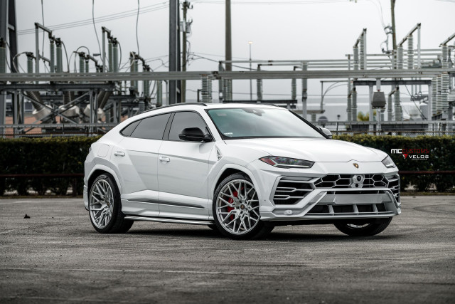 White car parking lot pipes free wallpaper - medium preview image