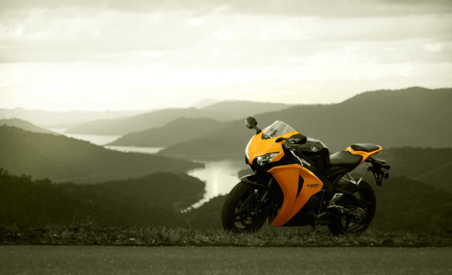 Motorcycle parked mountain range lake free wallpaper - medium preview image