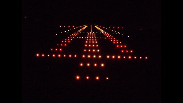 Large airplane flying dark lights free wallpaper - medium preview image