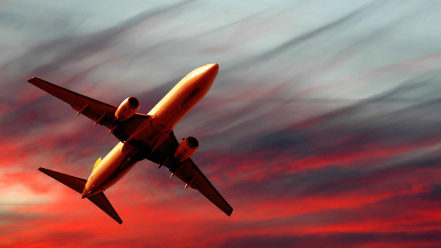 Plane flying red blue sky free wallpaper - medium preview image