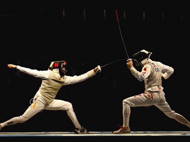 Two men fencing gear fighting free wallpaper - medium preview image