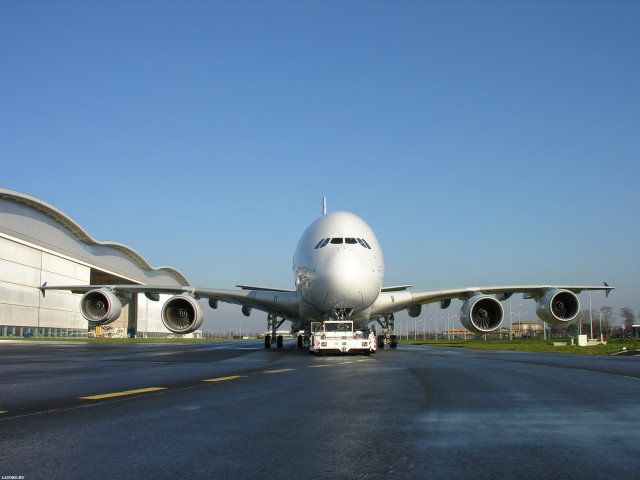 Jetliner airport runway building engine free wallpaper - medium preview image