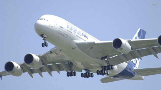 Jetliner flying blue sky landing free wallpaper - medium preview image
