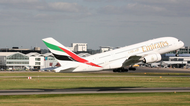 Large white airplane runway buildings free wallpaper - medium preview image