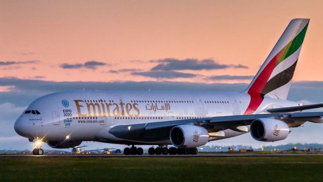 Large white airplane runway dusk free wallpaper - medium preview image