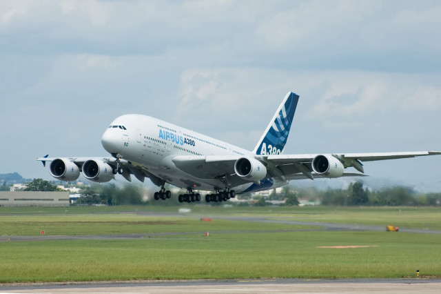 Jetliner taking off airport runway #5 free wallpaper - medium preview image