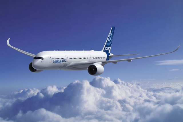 Large jetliner flying blue sky #2 free wallpaper - medium preview image