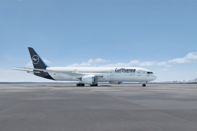 Large jetliner airport tarmac blue free wallpaper - medium preview image
