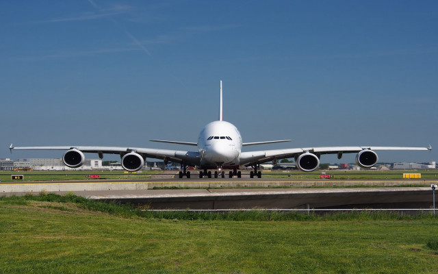 Jetliner airport runway grass fence free wallpaper - medium preview image