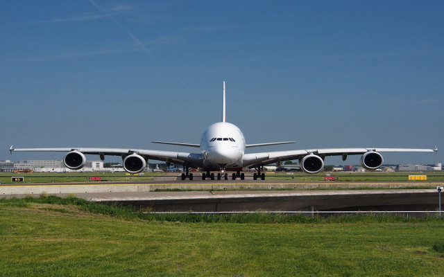 Jetliner airport runway grass fence #2 free wallpaper - medium preview image