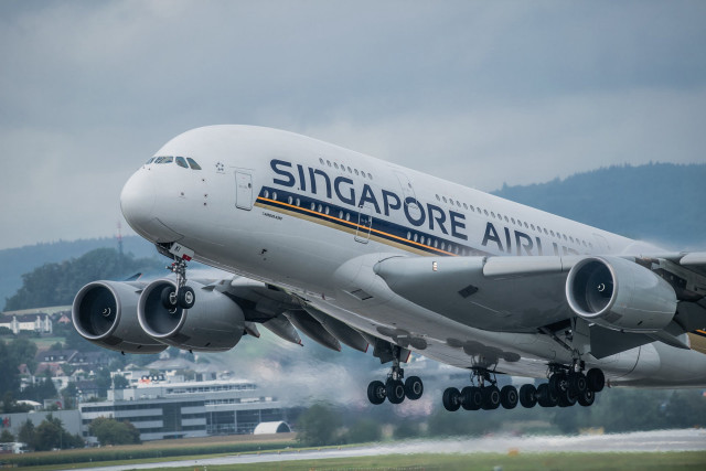 Jetliner takeoff smoke international style free wallpaper - medium preview image