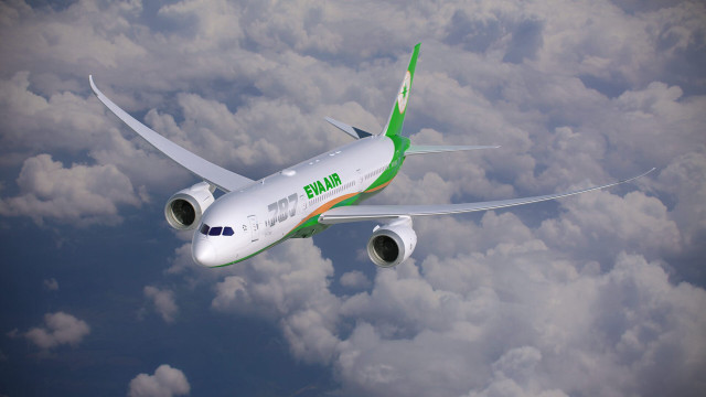 Jetliner flying cloudy sky above free wallpaper - medium preview image