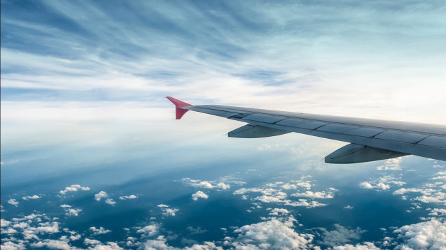 Plane wing clouds water blue free wallpaper - medium preview image